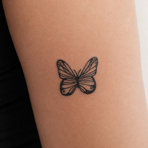 Delicate Butterfly Tattoo