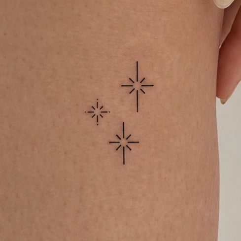 Three Star Spark Tattoo