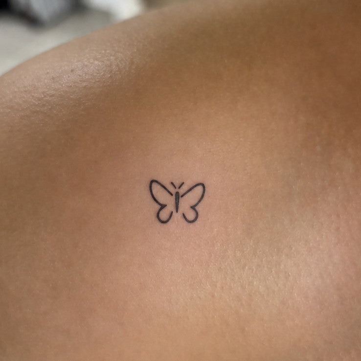 Tiny Butterfly Tattoo