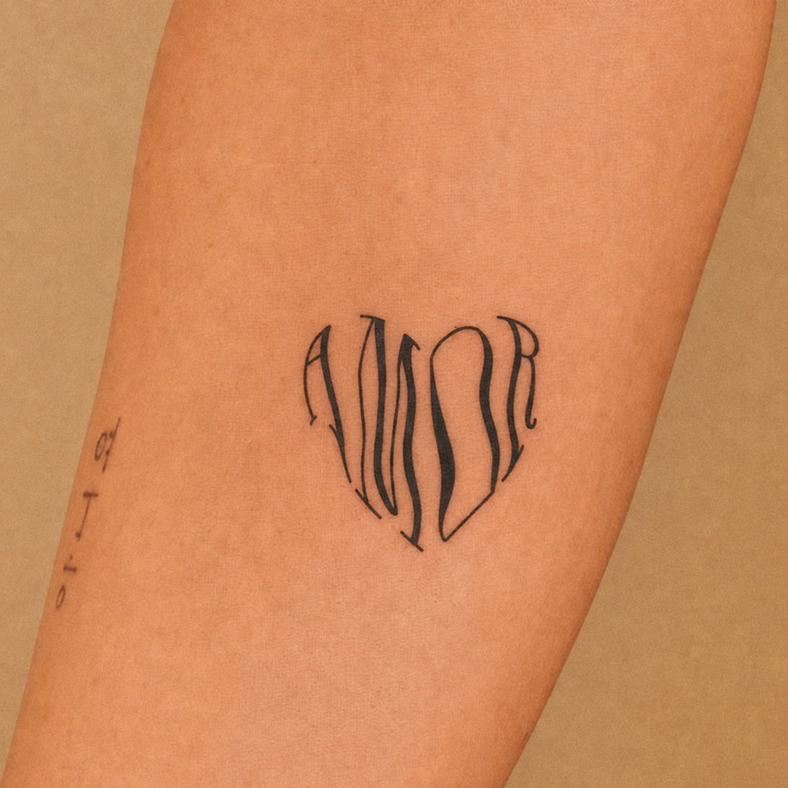 Amor in Bloom Tattoo