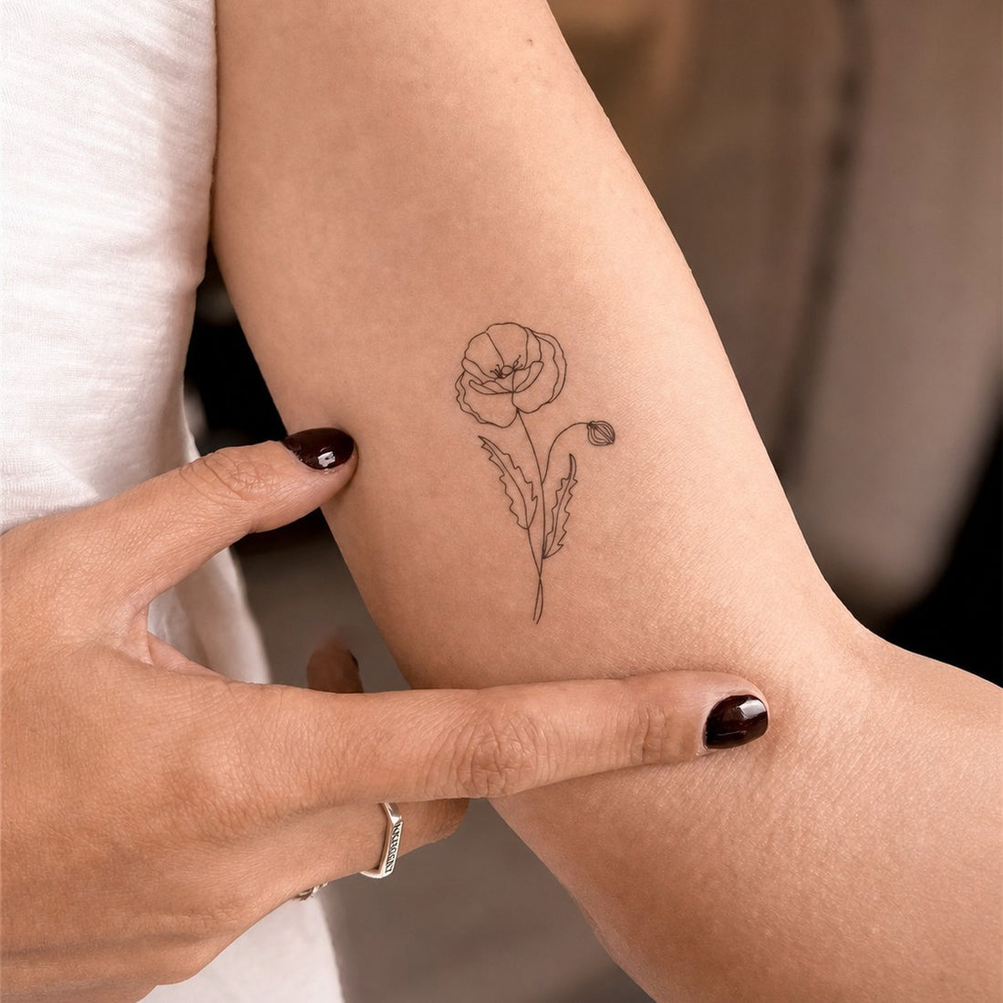 August Poppy Glow Tattoo