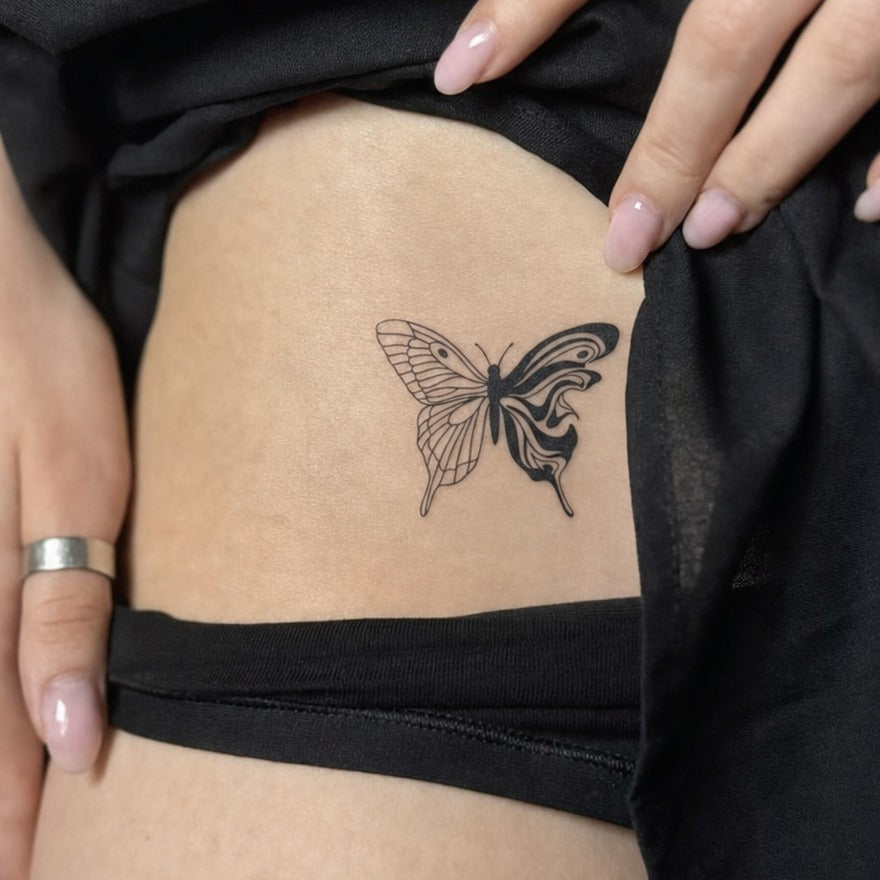 Fluid Wings Tattoo