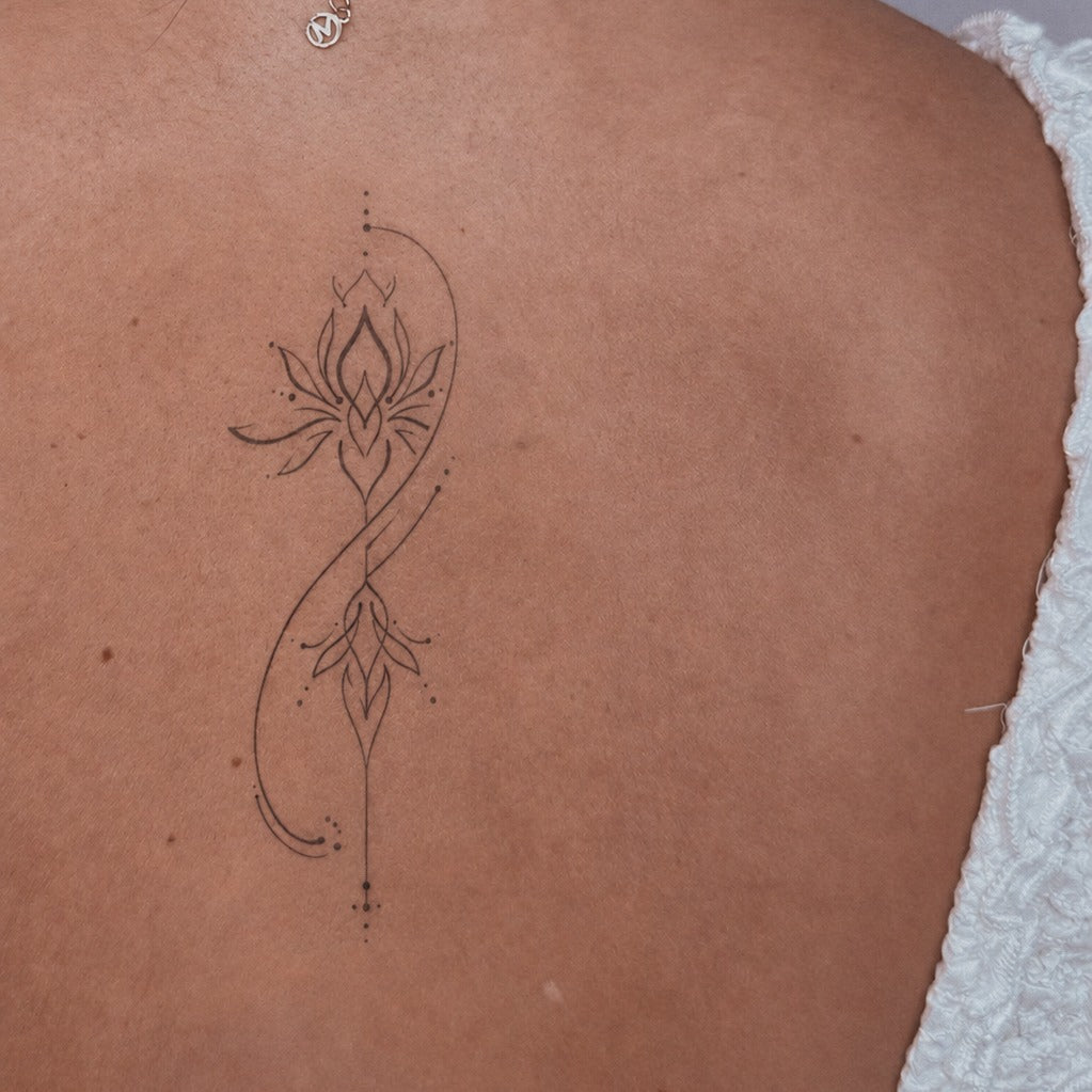 Geometric Lotus Glow Tattoo