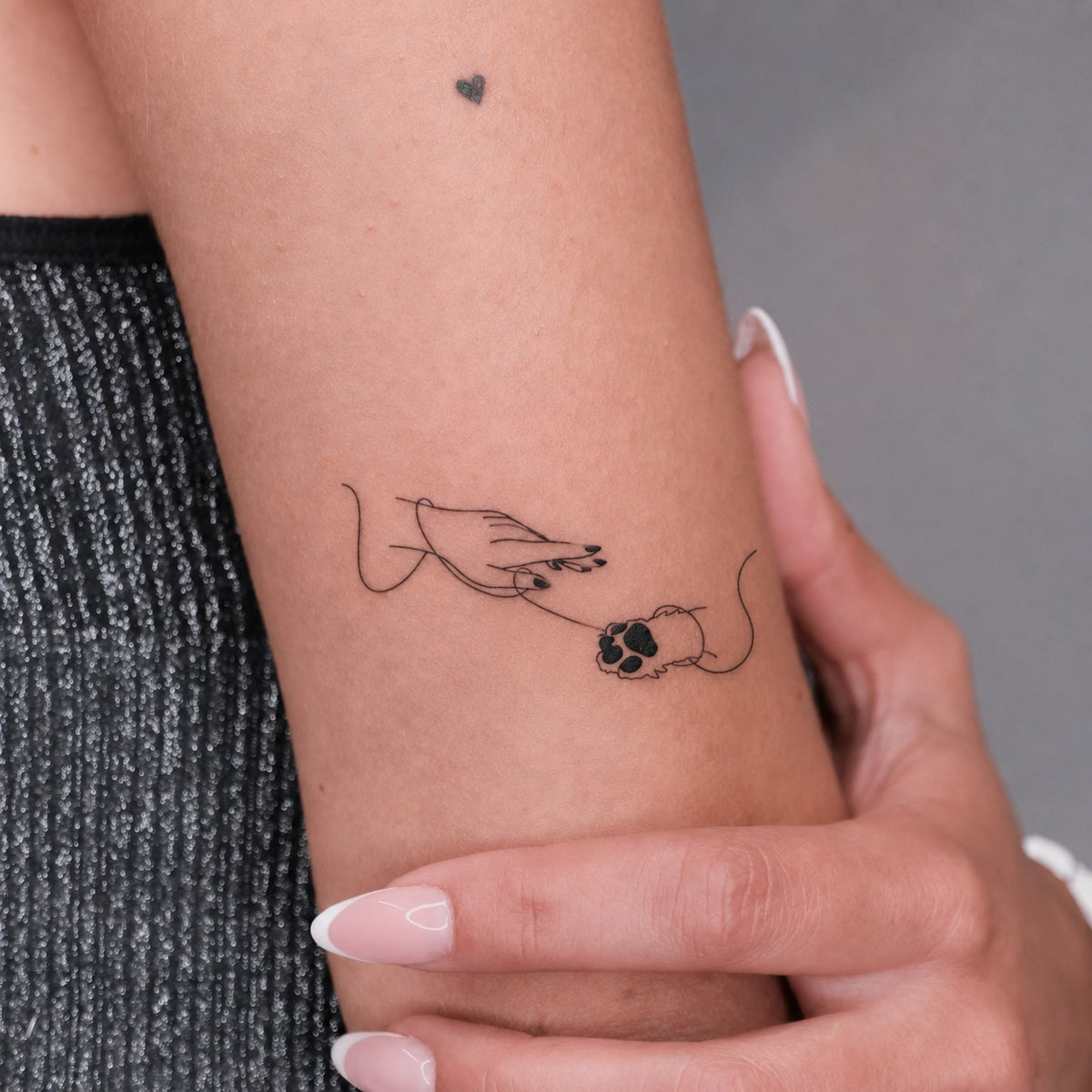 Unconditional Paw Tattoo