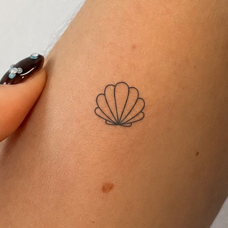 Seashell Whisper Tattoo