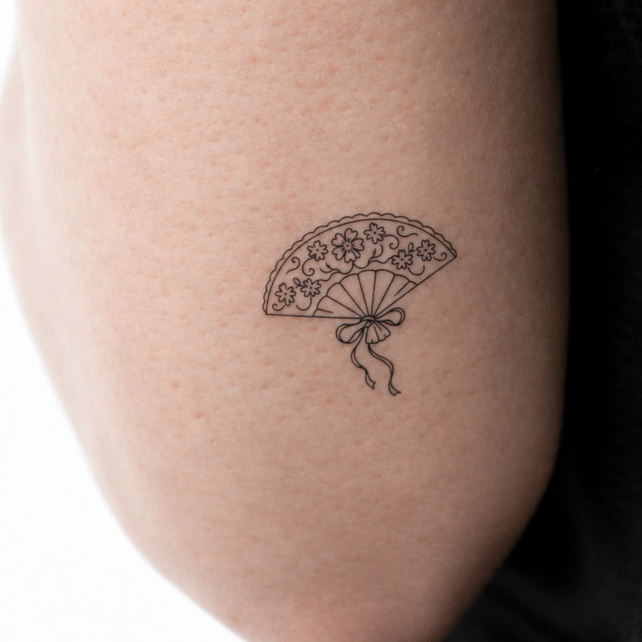 Folding Grace Tattoo