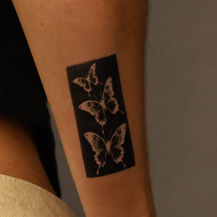 Wings in Shadow Tattoo